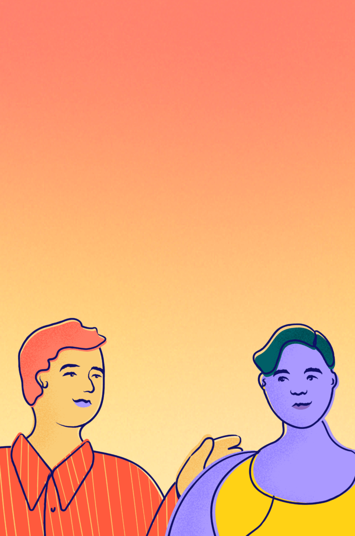 A friend puts an arm on another friend's shoulder outside on a sunny day.