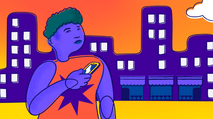 A young person with short hair and a tank top holds their phone in front of a cityscape.