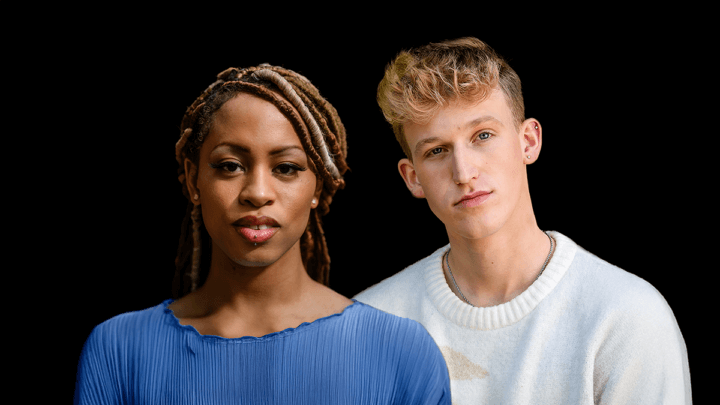 Tyler and Carmen standing next to each other against a black background.